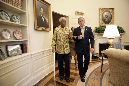 George W. Bush and Nelson Mandela - walking - Oval Office - May 17 2005.jpg